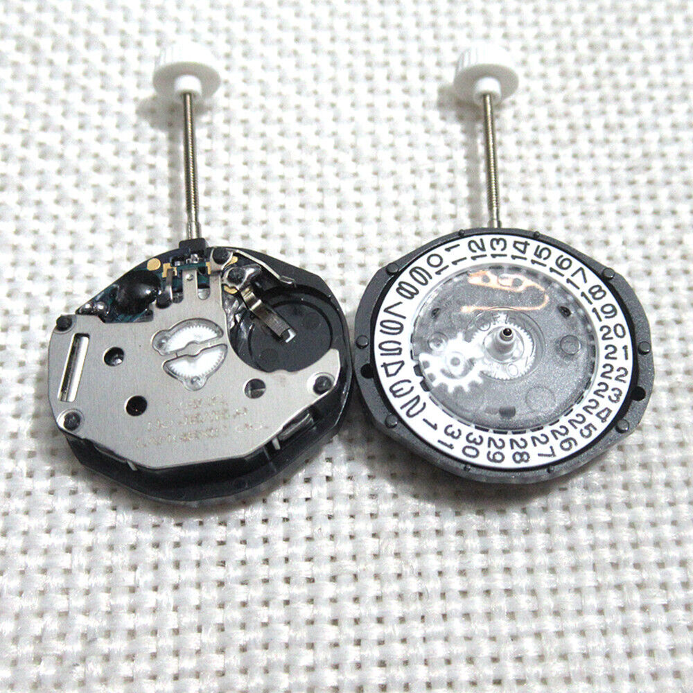 Watchmakers watch part LG22 quartz movement with date display at 3 o'clock for precise repair.