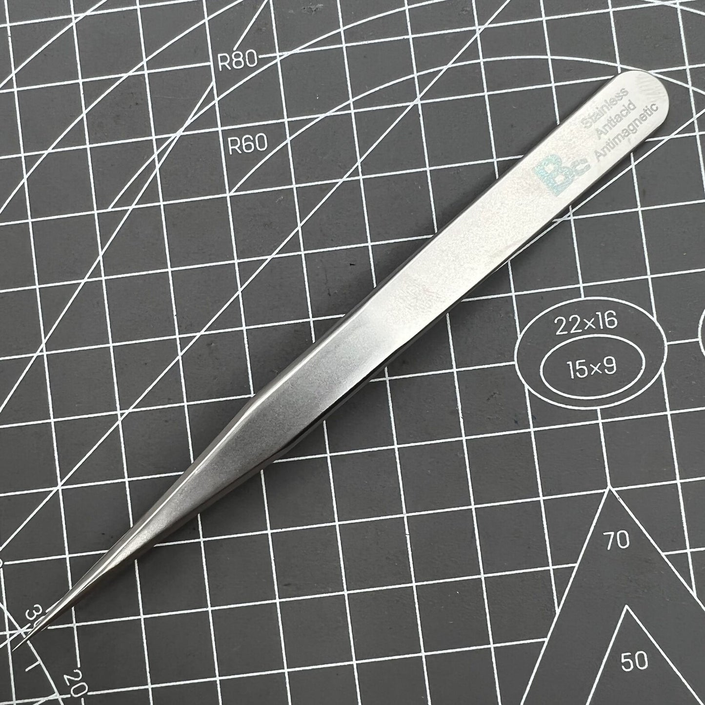 Bergeon 7026-3 antimagnetic tweezers for precise fine hairspring handling in watch repair.