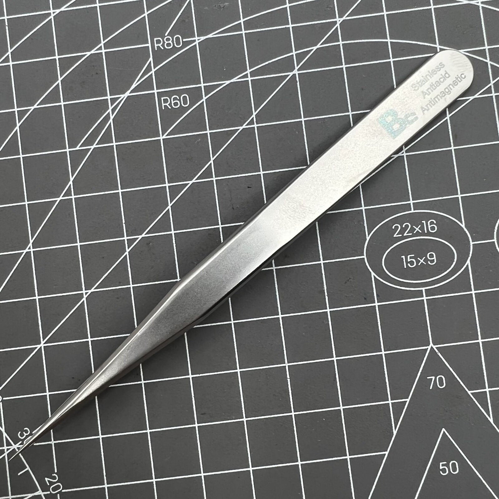 Bergeon 7026-3 antimagnetic tweezers for precise fine hairspring handling in watch repair.