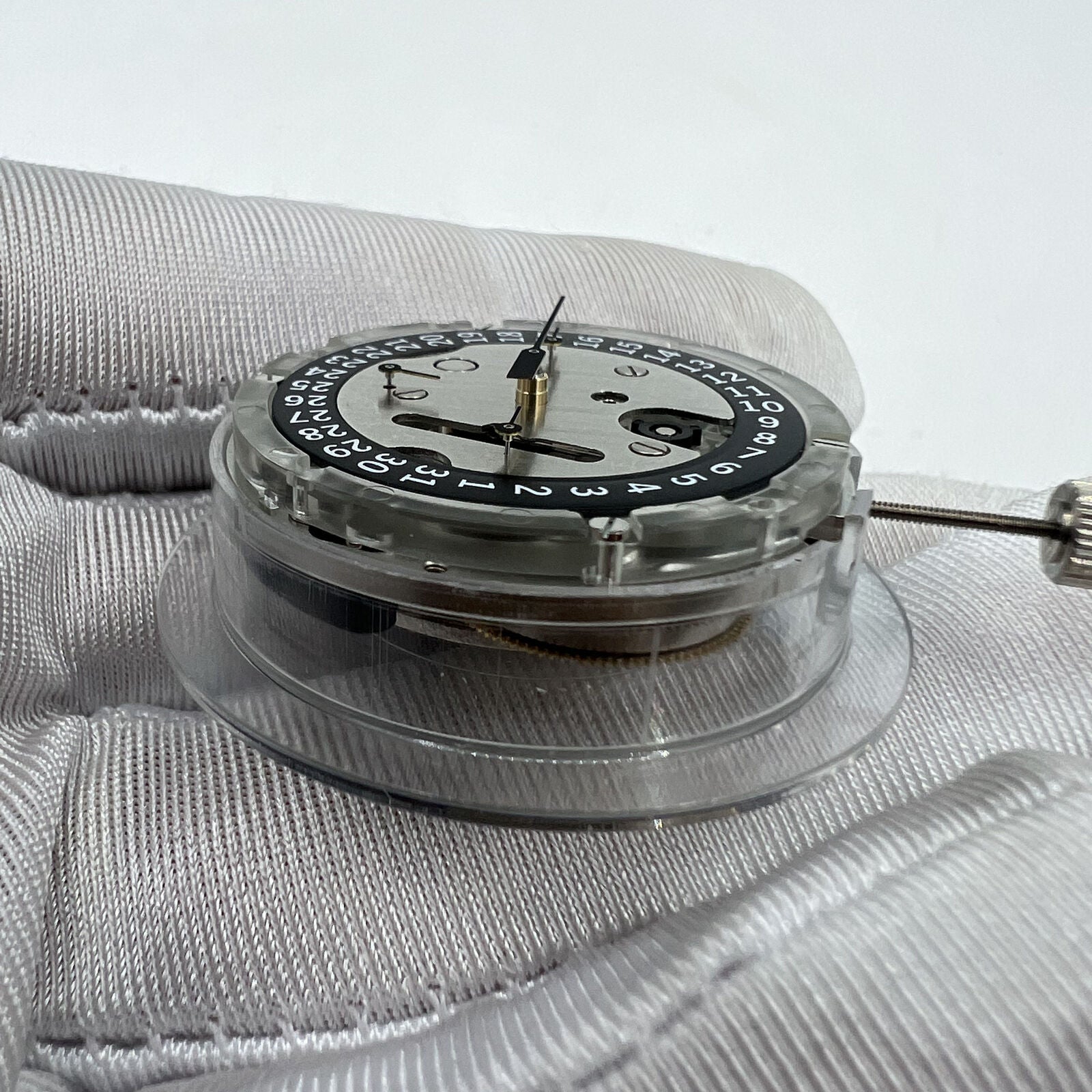 1853 Swiss Made ETA C01.211 chronograph watch movement with black dial and mechanical precision.