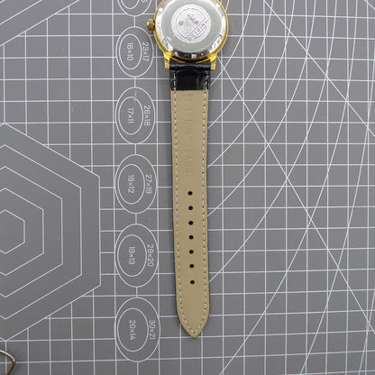 Beijing Double Rhomb watch with golden case, silver nail markers, manual movement for timeless elegance.