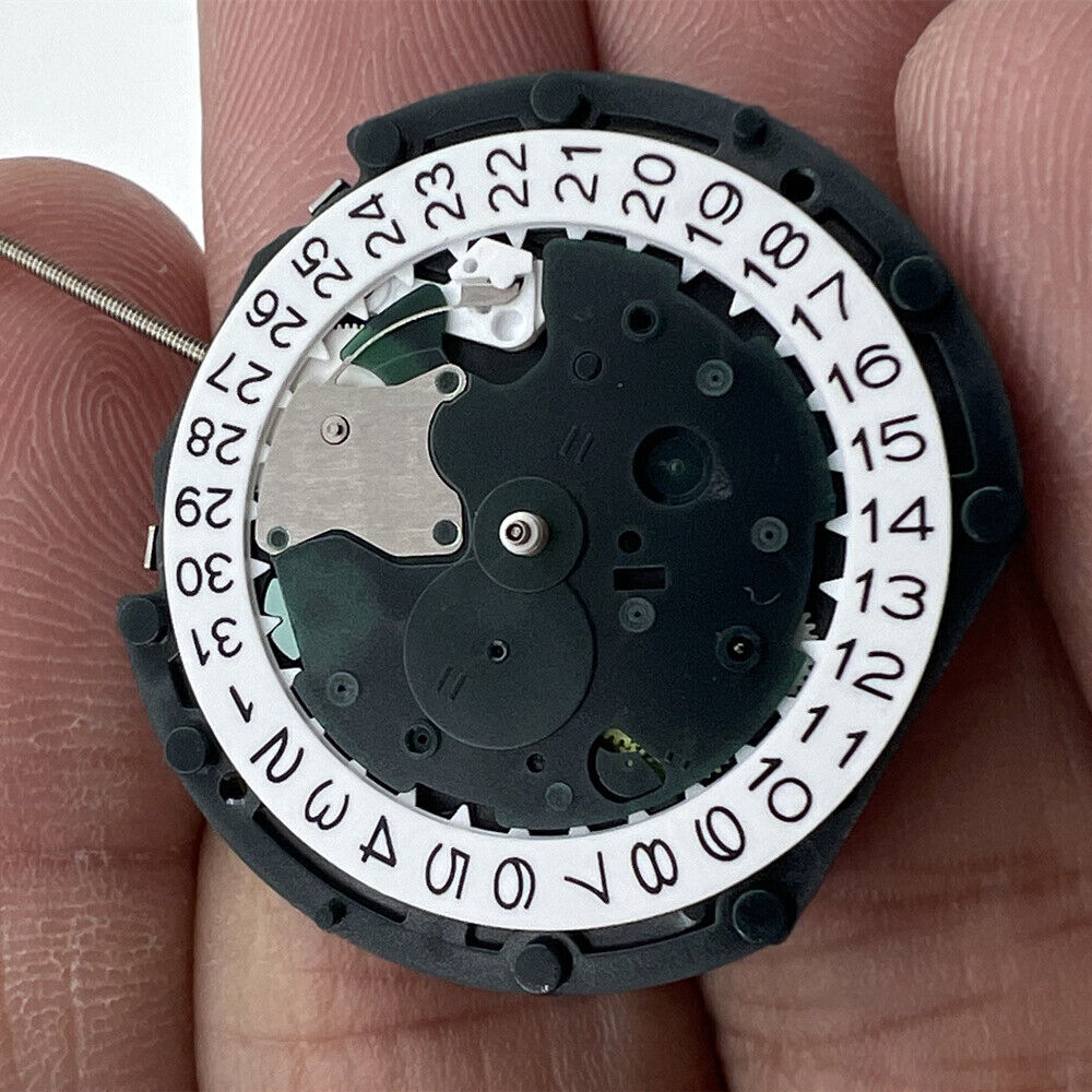 Sunon PE48 quartz watch movement with 2 hands and small seconds at 3 o'clock for precise timekeeping.