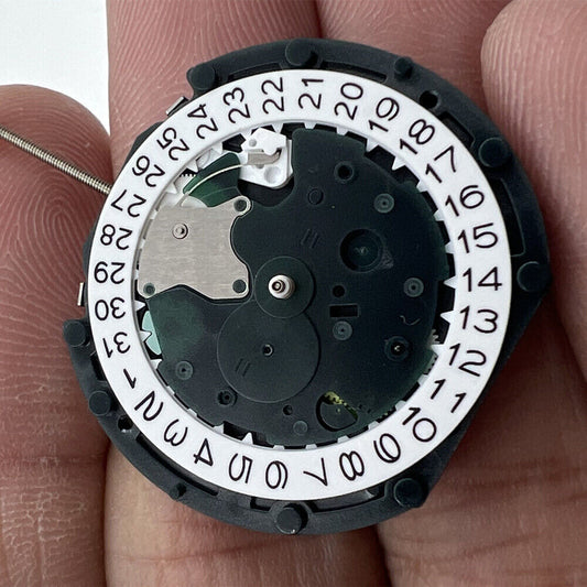 Sunon PE48 quartz watch movement with 2 hands and small seconds at 3 o'clock for precise timekeeping.
