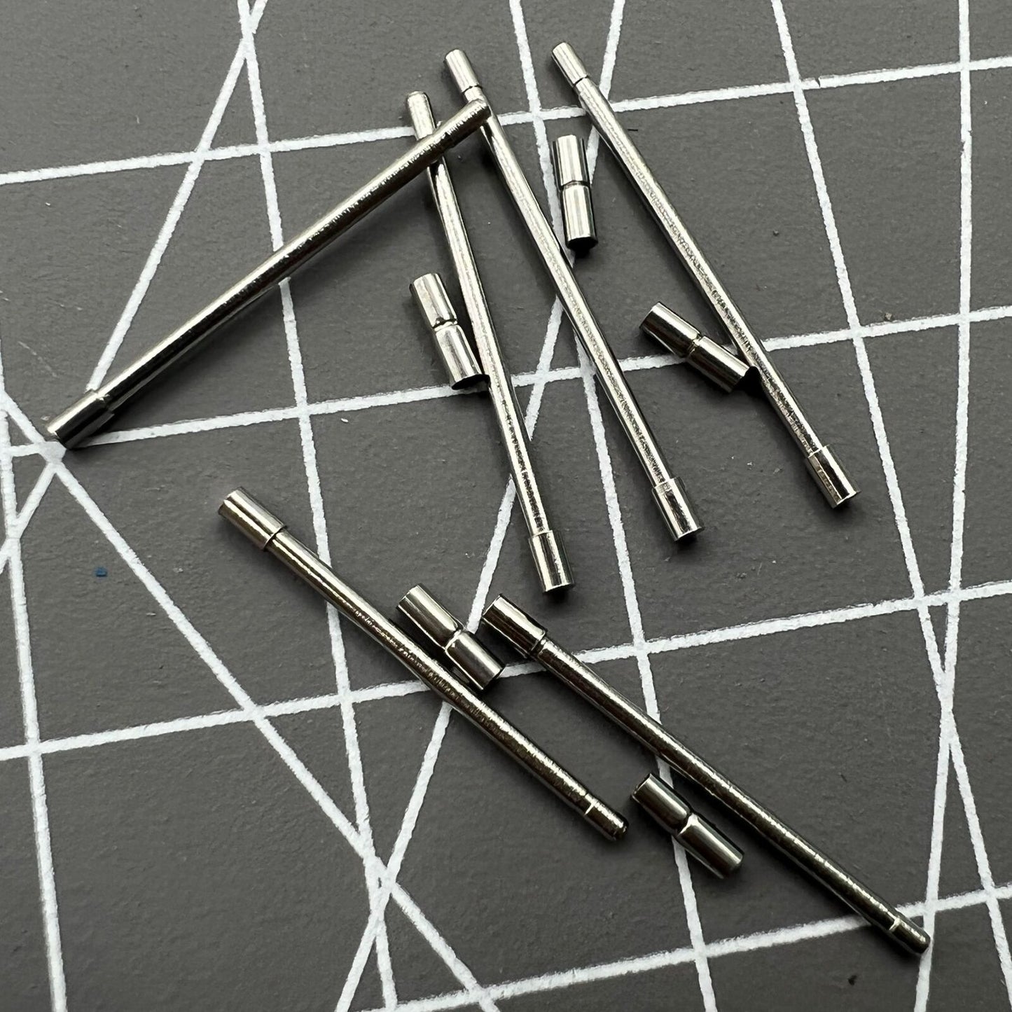 Stainless steel AB-638NTWP notched tubes with pins for secure watch band assembly, 60pcs box.