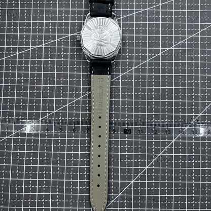 Taihang 32mm manual mechanical watch with black strap, gold markers, and black dial for classic elegance.