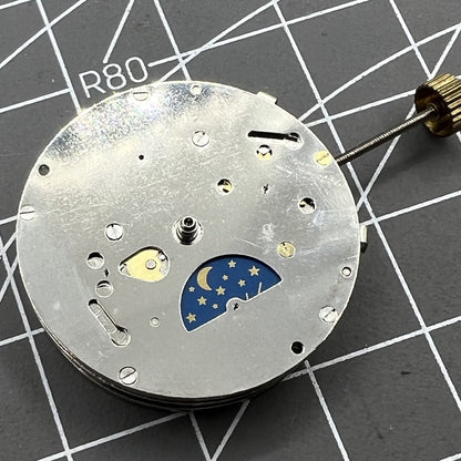 2813 8205 8215 watch showing automatic mechanical movement with moon phase at 6 o'clock, China Made.