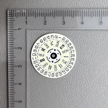 White date and week disk wheels with green lume for Seiko NH36, improving dial visibility in low light.