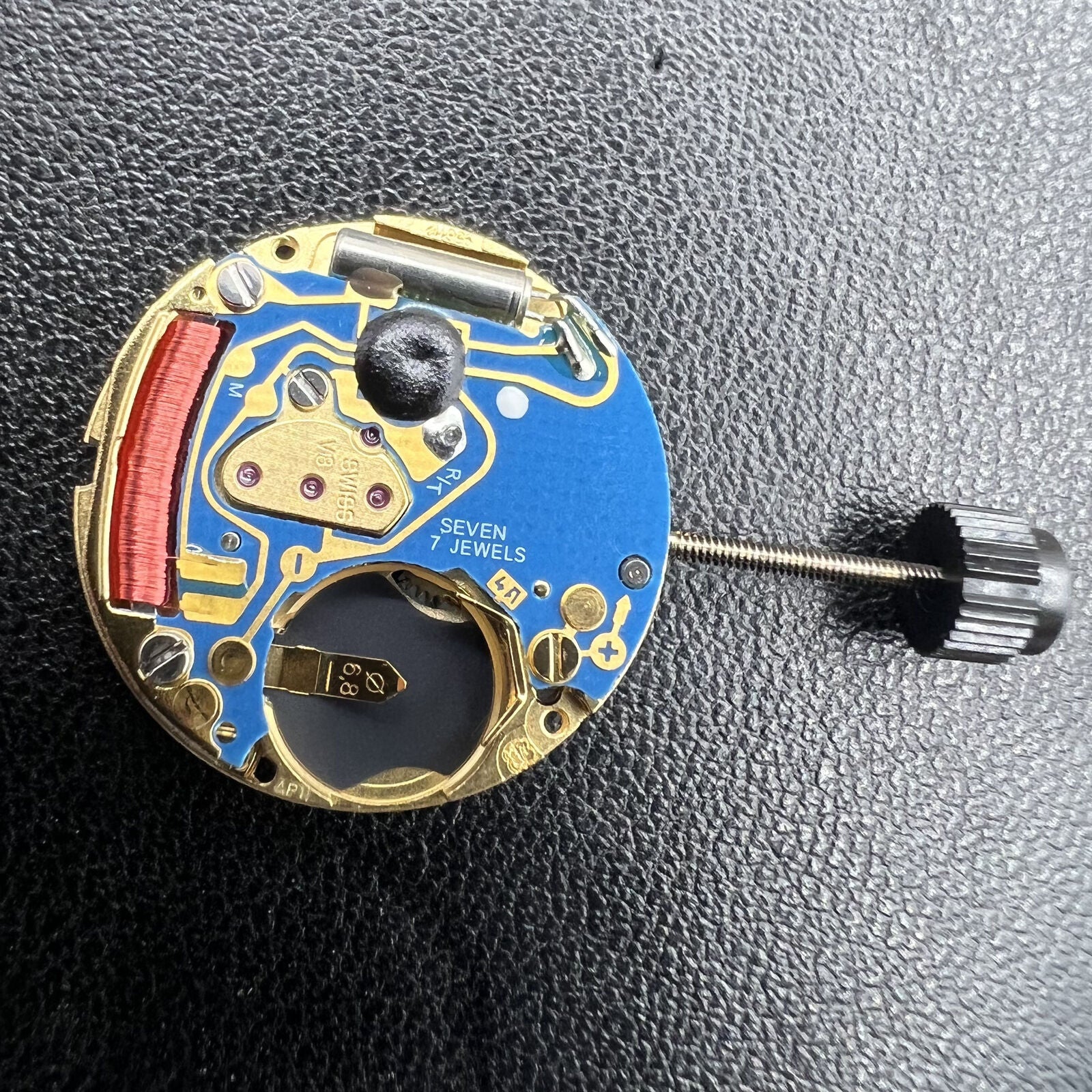 ETA 956.112 black dial watch with quartz movement, 3 hands, date display, ideal for daily wear by ETA.