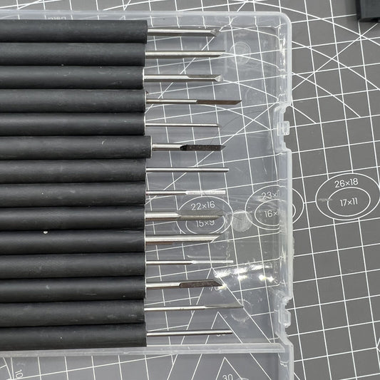 1. 14-piece steel chisel set for precise wood carving  