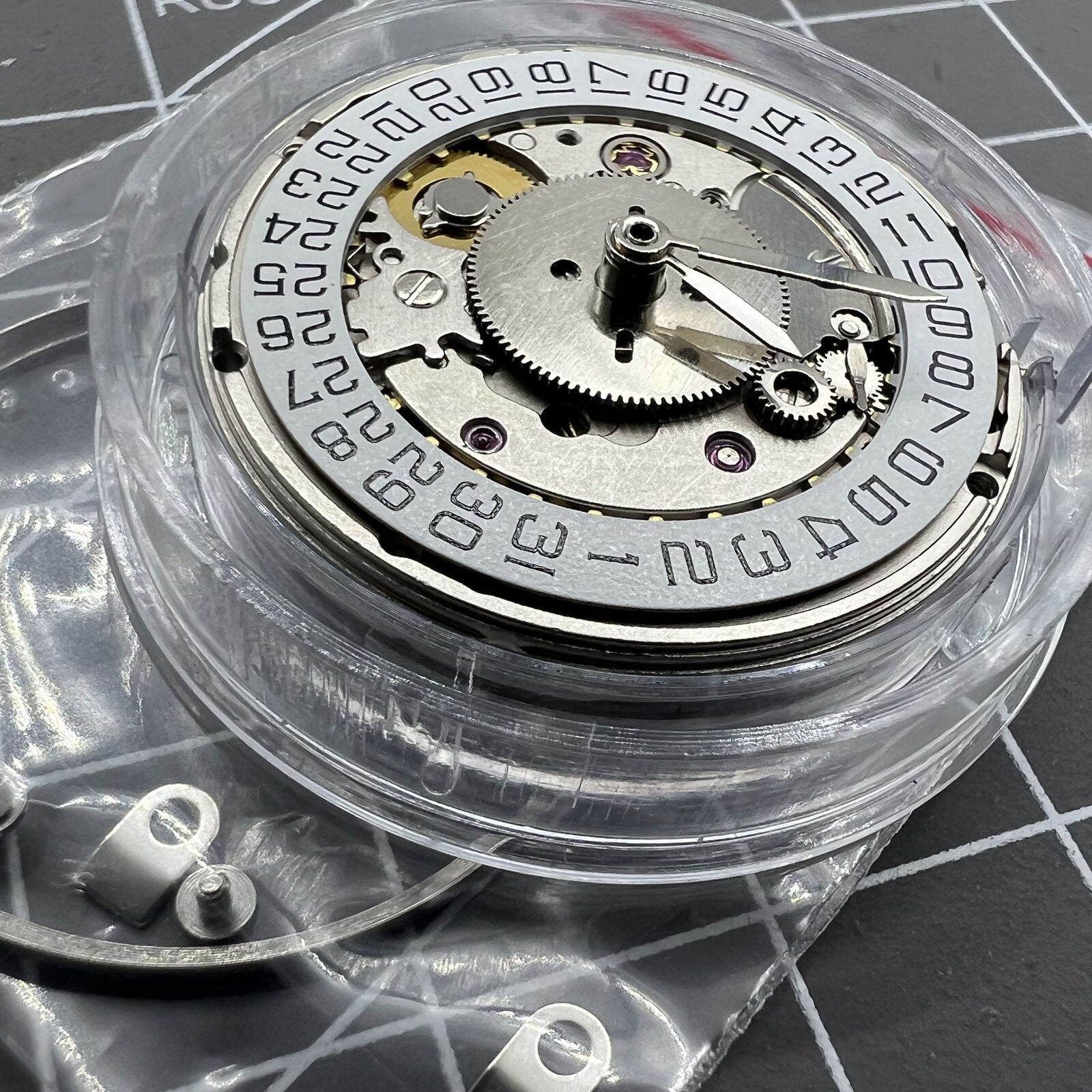 HZ6460 watch accessory showcasing 4 hands automatic GMT mechanism with ETA 2836-2 movement.