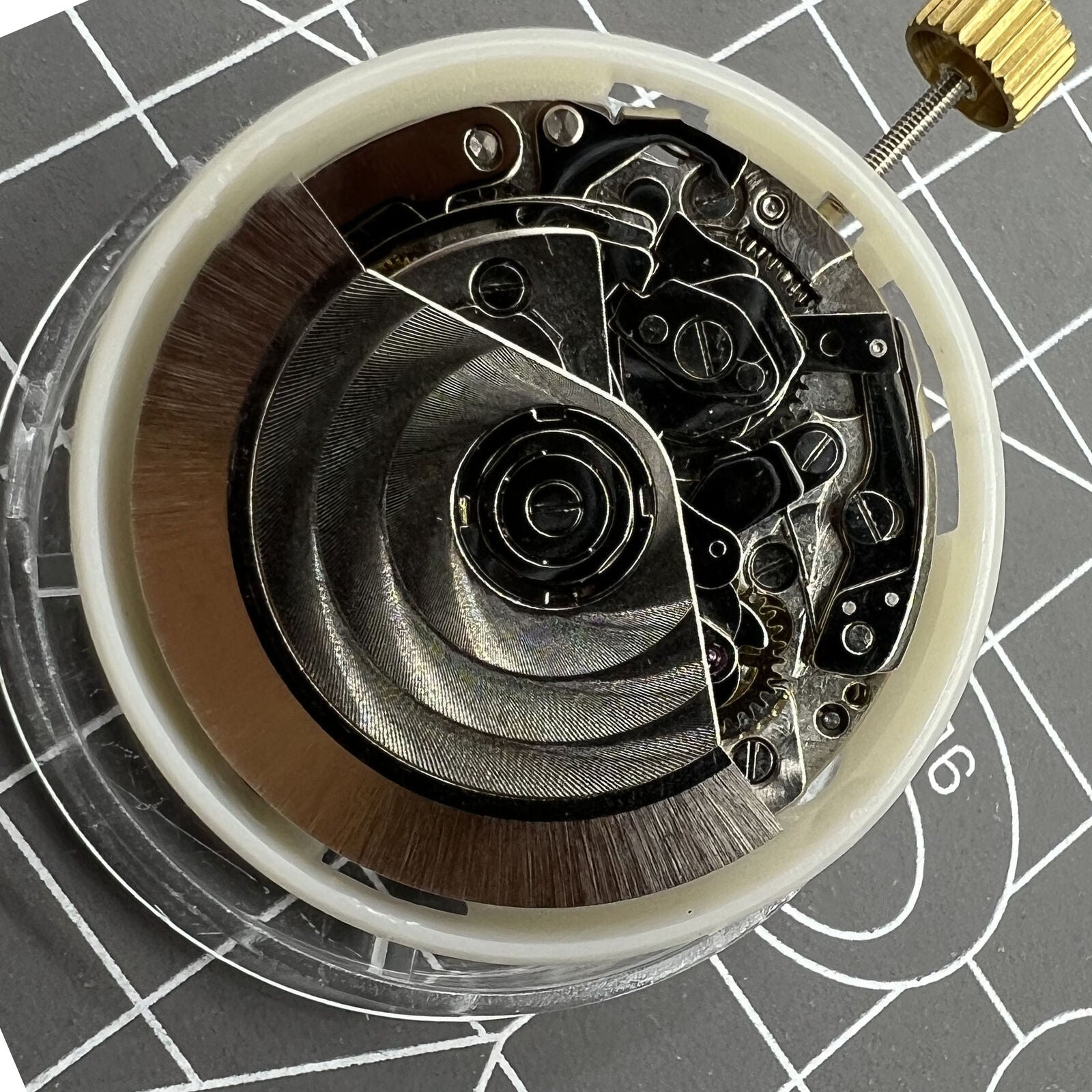 Dandong 7750 automatic watch movement with small seconds at 6 o'clock, ultra-thin design for precise timekeeping.