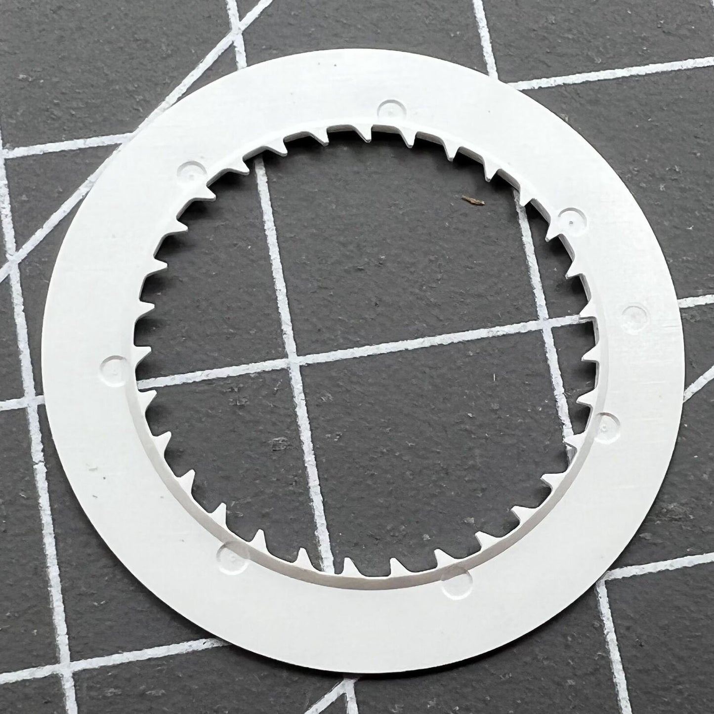 Seiko-compatible NH35 NH36 watch movement date wheel disk with orange numerals on black background.