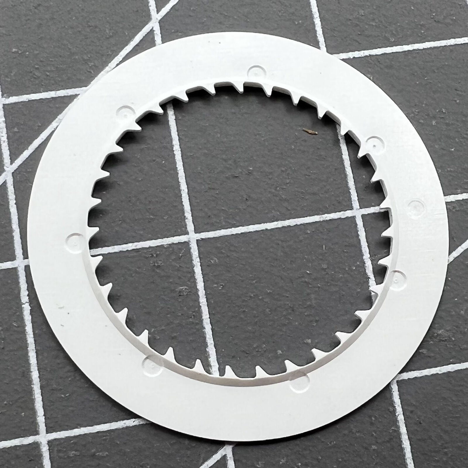 Seiko-compatible NH35 NH36 watch movement date wheel disk with orange numerals on black background.