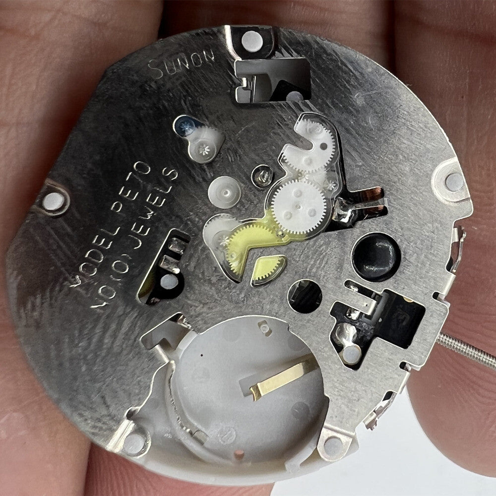 Sunon PE70 quartz watch movement featuring 3 hands, 3 sub-dials, and date display at 3 o'clock for precision timekeeping.