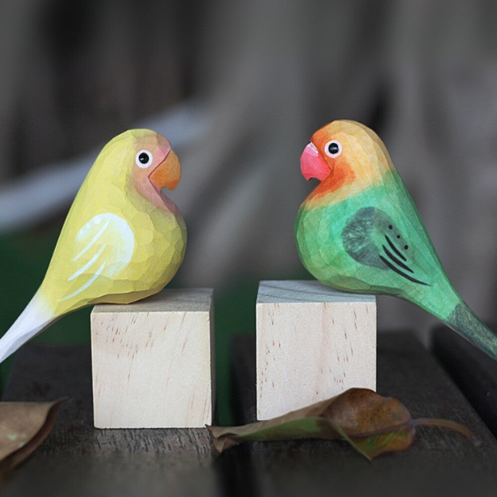 Handcrafted green and yellow Agapornis Fischeri wooden figurine, decorative watch accessory.