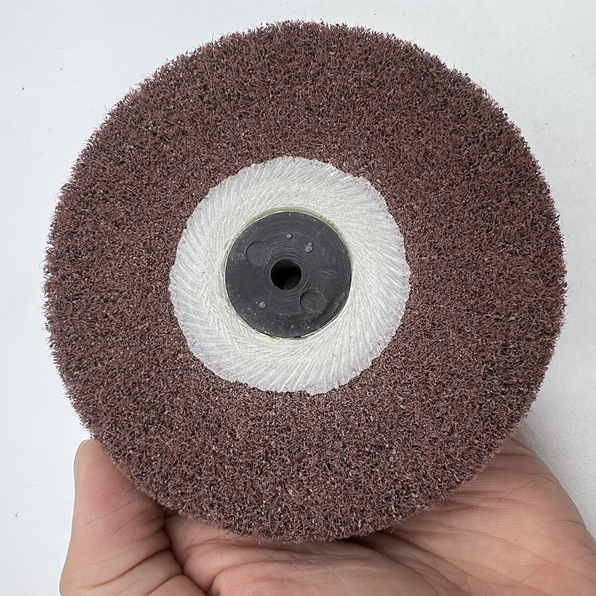 Bergeon 6085-F2 aluminum oxide polishing brush for fine abrasive finishing on watch components.