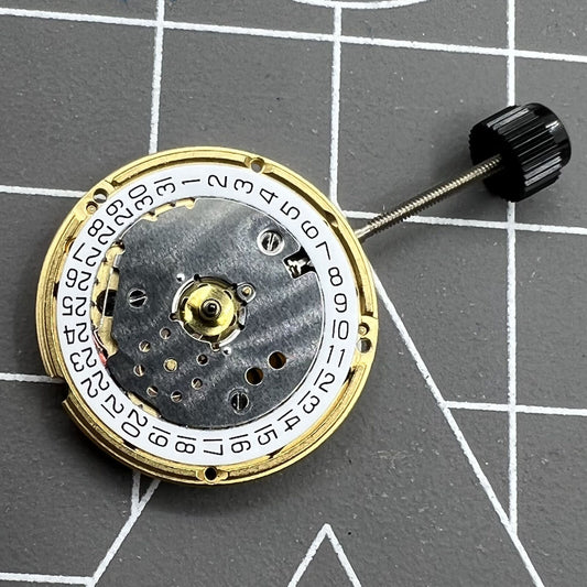 Swiss Made ETA F03.111 quartz watch movement with 3 hands and date display at 3 o'clock.