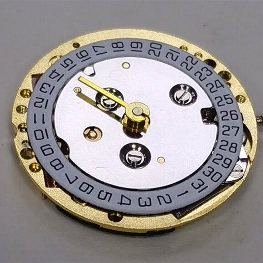 Golden ISA 222 quartz watch movement with 2 hands and calendar, ideal for lady?s watch repair.