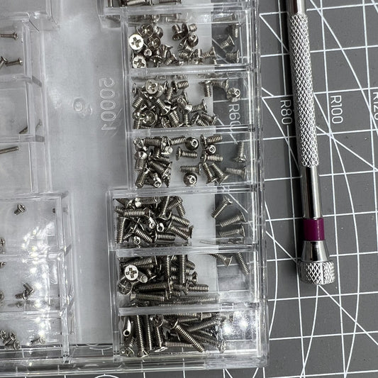 Set of 18 assorted specification screws for glass watch repair, ideal for jewelry fixing and maintenance.
