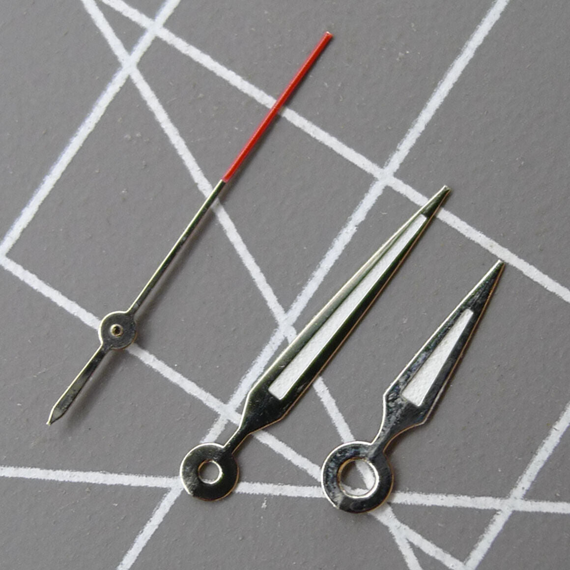 Luminous arrow-shaped watch hands compatible with Miyota 2035 quartz movement, enhancing time visibility.