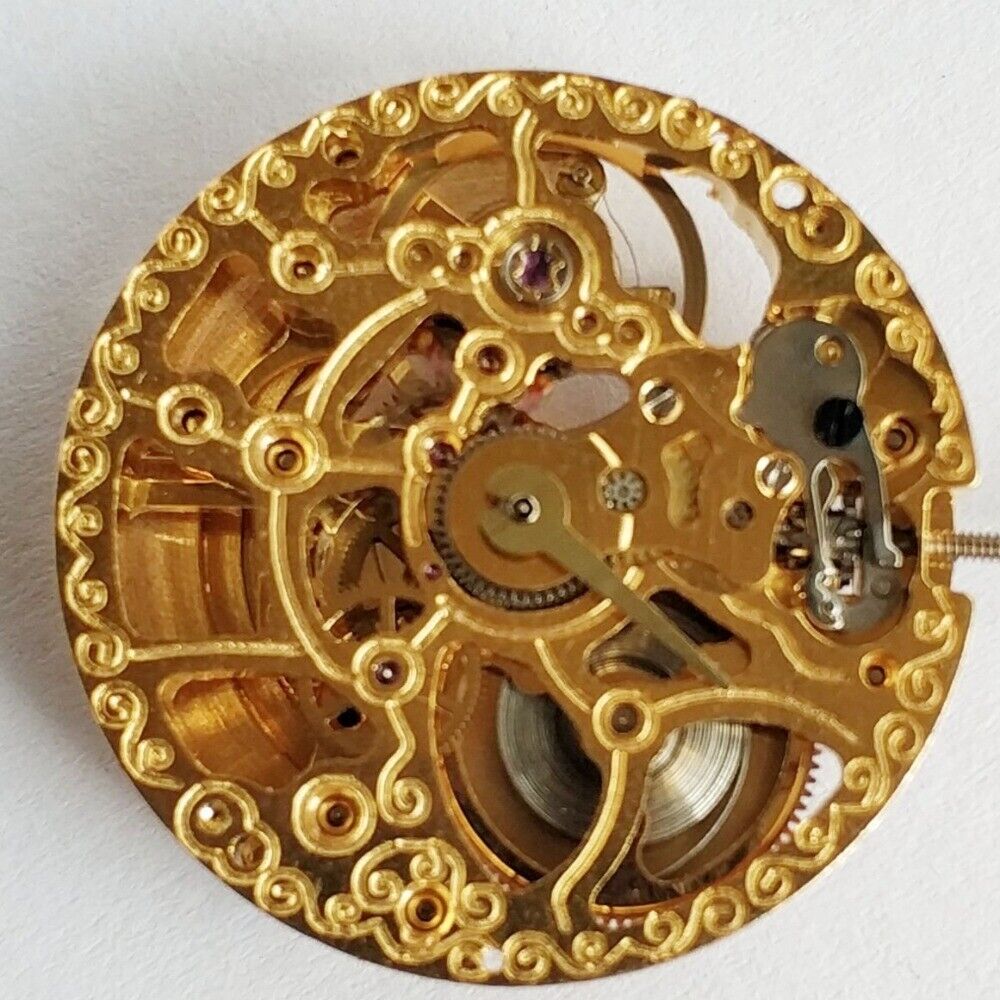 Golden hollow automatic mechanical watch movement, China Made, ideal for practice and repair projects.