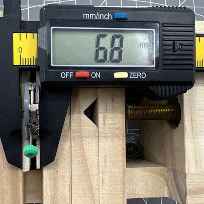 Miyota FS20 chronograph watch movement with date window at 3 o'clock, Japan quartz precision mechanism.