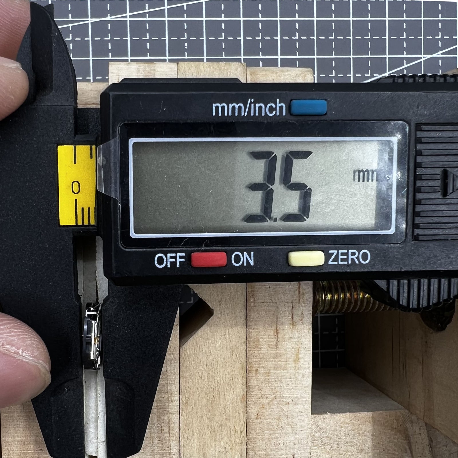 Hattori VX01 quartz watch movement with hour, minute, second hands for accurate watch repair.