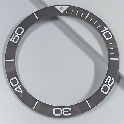 Ceramic blue luminous bezel ring by Conquest for 38.5mm watch, enhancing style and durability.