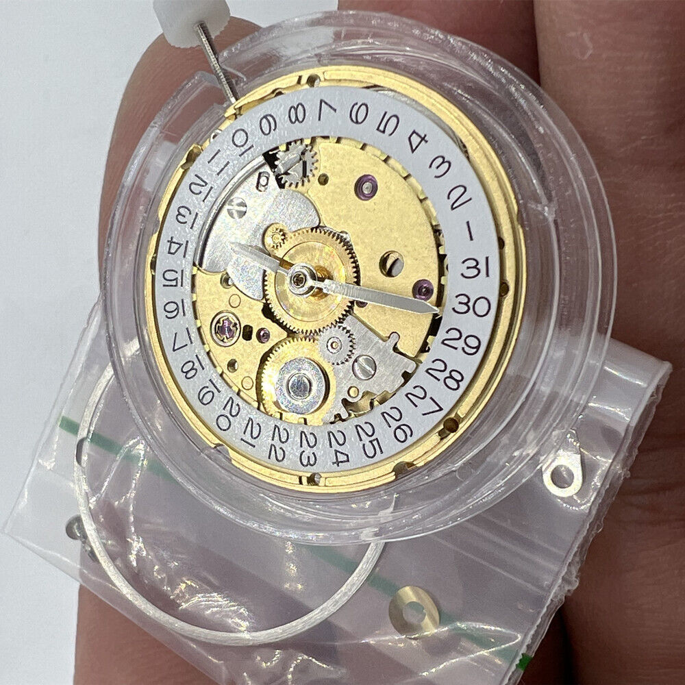 TIANJIN ST2130 golden mechanical watch movement with single calendar, for precise timekeeping and durability.