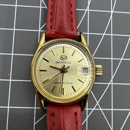Seagull lady watch with golden dial, 19 jewels, manual mechanical movement from Tianjin factory, China.