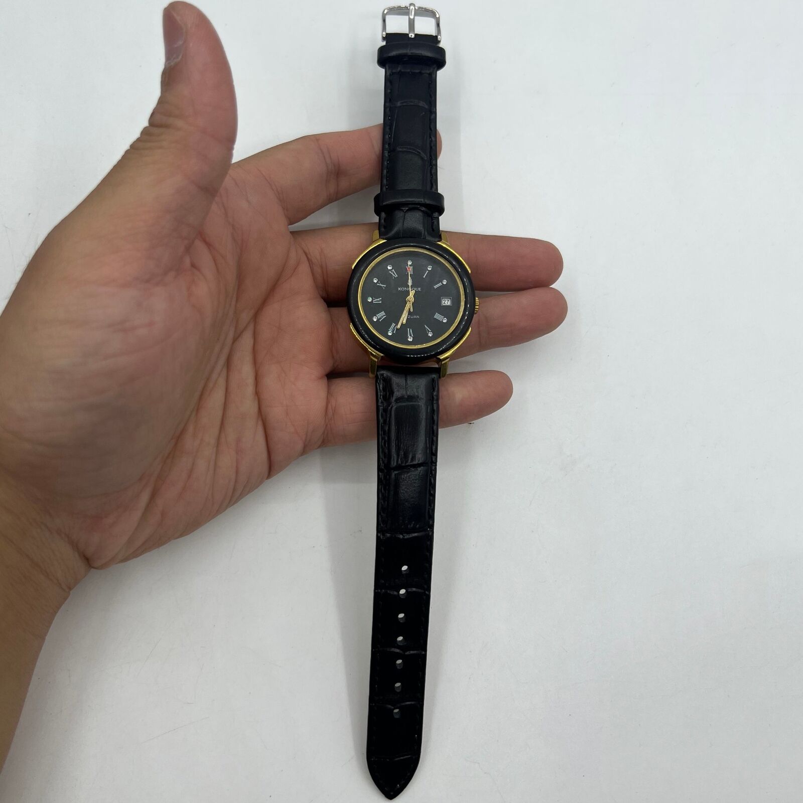 37mm Kongque automatic watch with black dial, Roman numerals, and 33 jewels for accurate timekeeping.