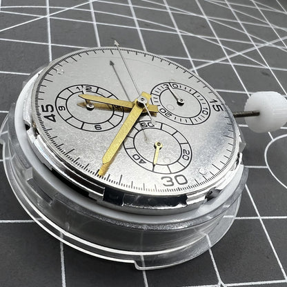 Chinese 4130 automatic watch movement displaying small second subdials at 3, 6, and 9 o'clock for precise timekeeping.