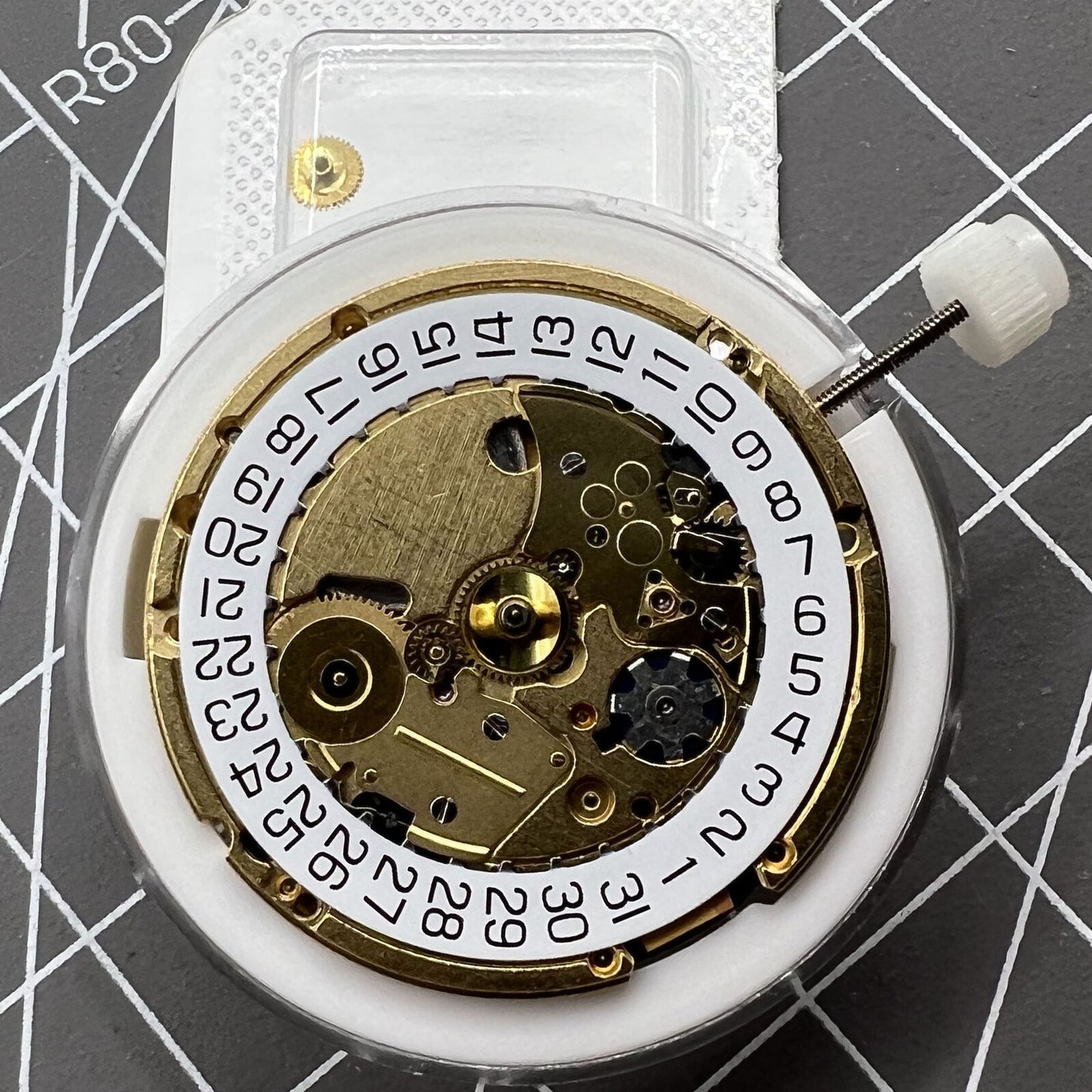 Swiss Made ETA205.911 golden watch movement for kinetic energy watches by ETA, precision craftsmanship.