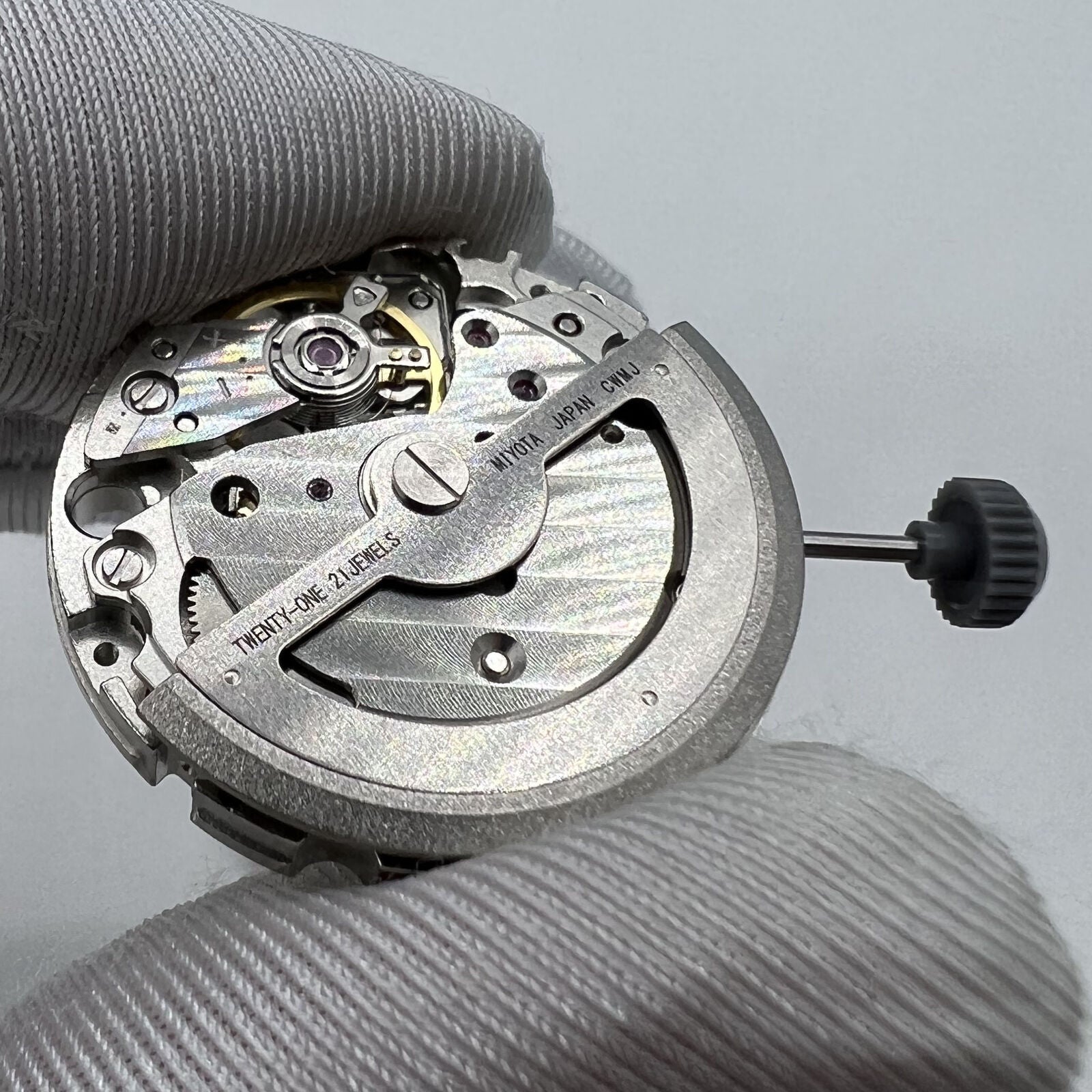 Miyota/Citizen 82S7 automatic watch movement, silver plated, precision Japan-made mechanism for watch repairs.