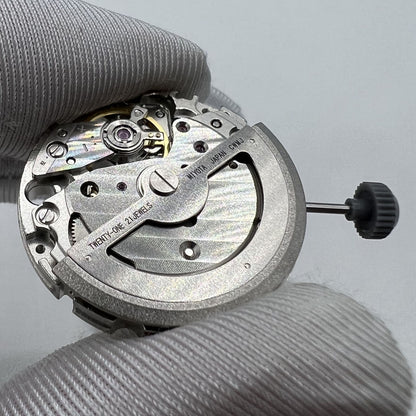 Miyota/Citizen 82S7 automatic watch movement, silver plated, precision Japan-made mechanism for watch repairs.