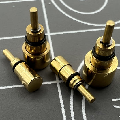 Set of 26 golden stainless steel watch pushers in 13 sizes, for precise adjustments.