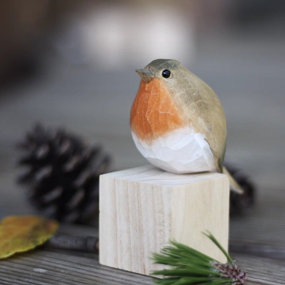 Handmade Redbreast wooden figurine, detailed decorative collectible sculpture.