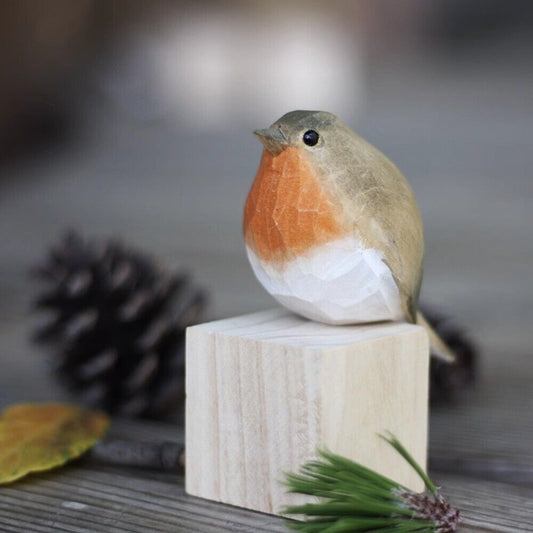 Handmade Redbreast wooden figurine, detailed decorative collectible sculpture.