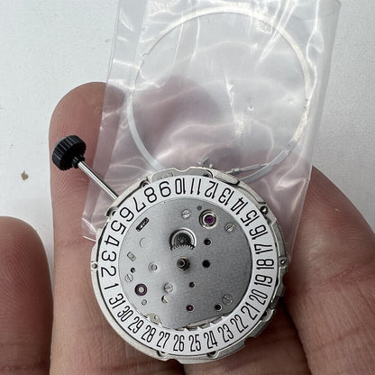 Miyota Citizen 9015 automatic mechanical watch movement with date display at 3 o?clock for precise timekeeping.