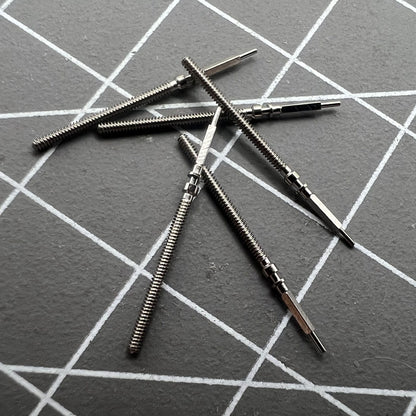 Precision watch winding stem for Omega 560 movement, high-quality replacement part for timekeeping repair.