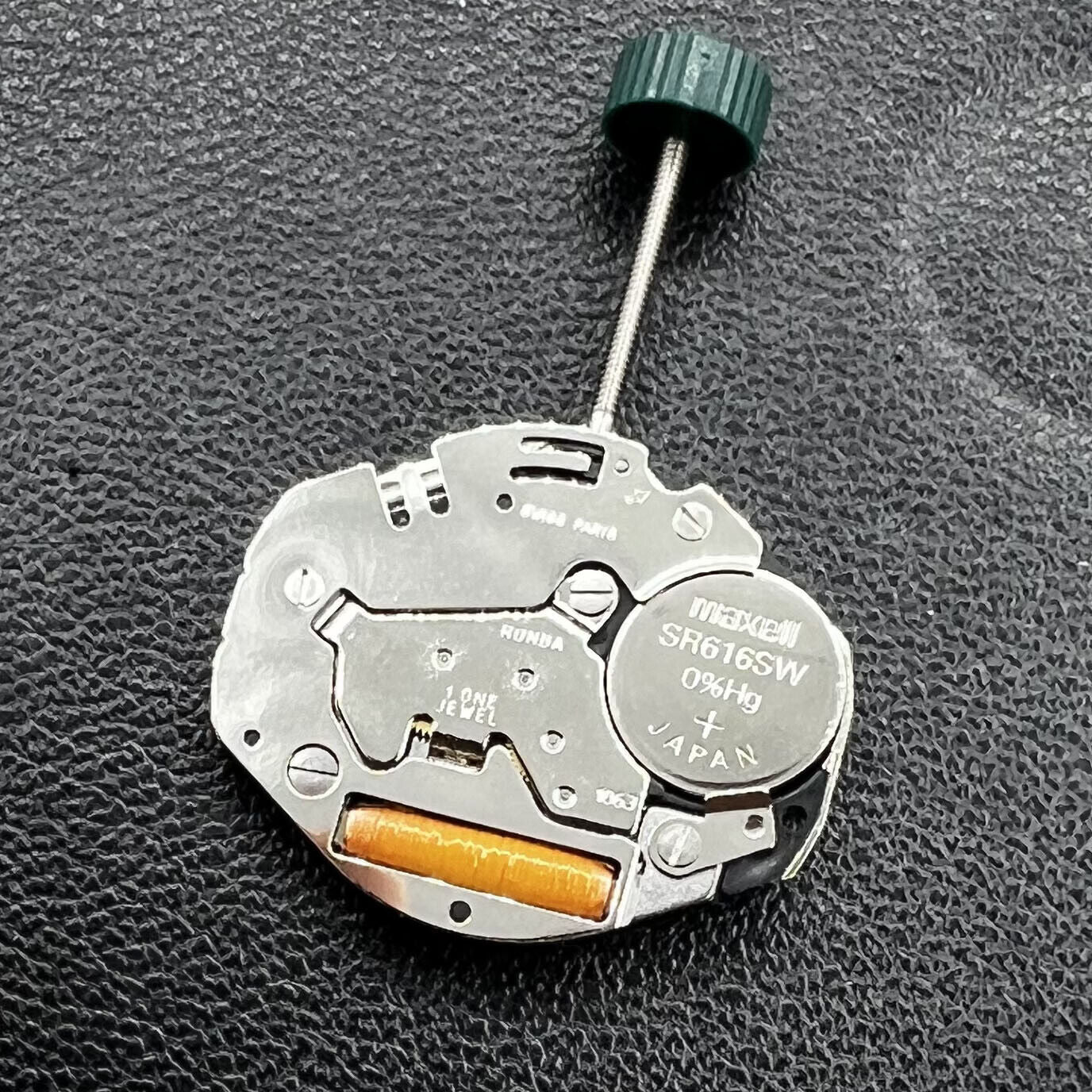 Swiss Ronda 1063 quartz watch movement with three hands, precision timekeeping for quality watch repair.