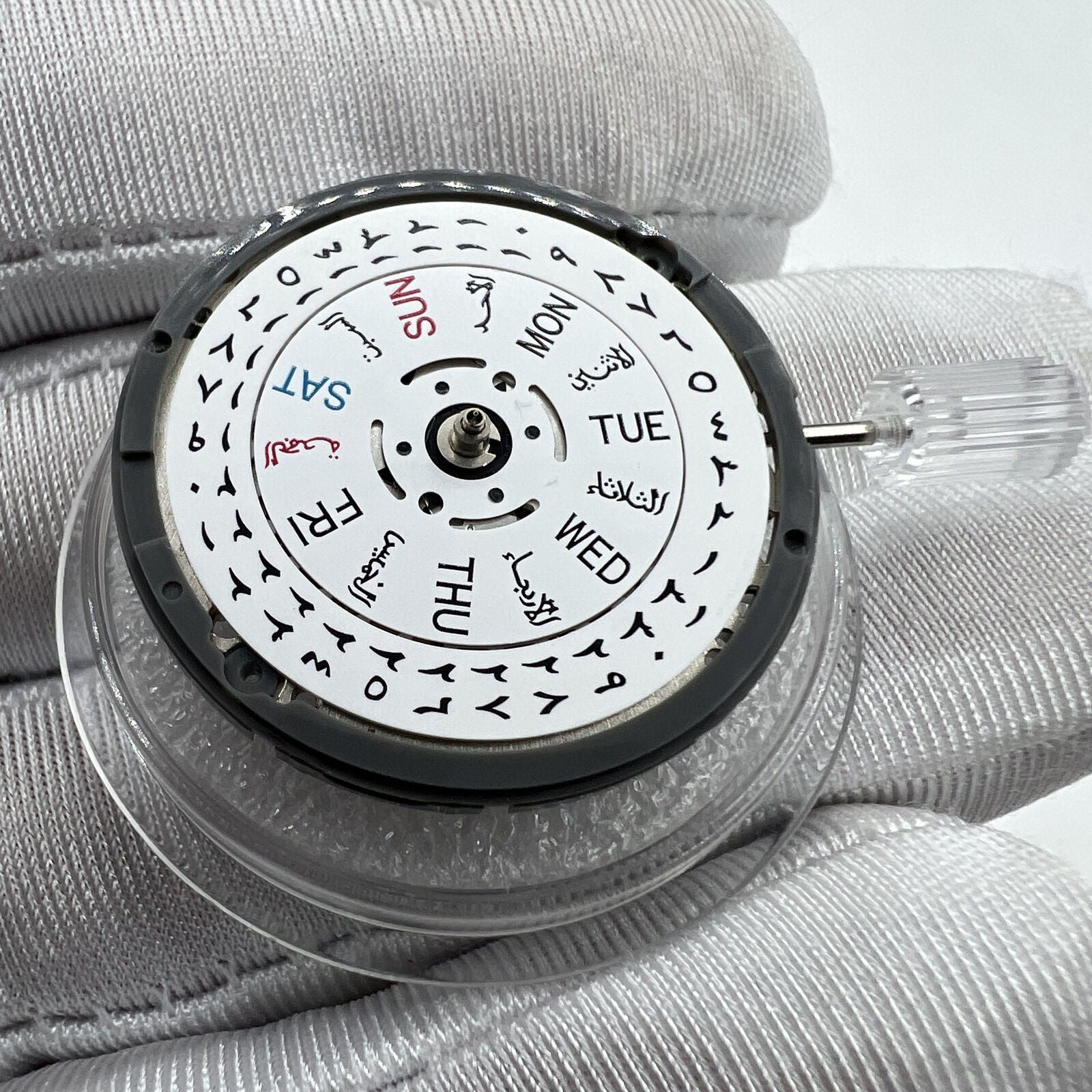Japan Made NH36 automatic watch movement with Arabic date dial and side crown for precision timekeeping.