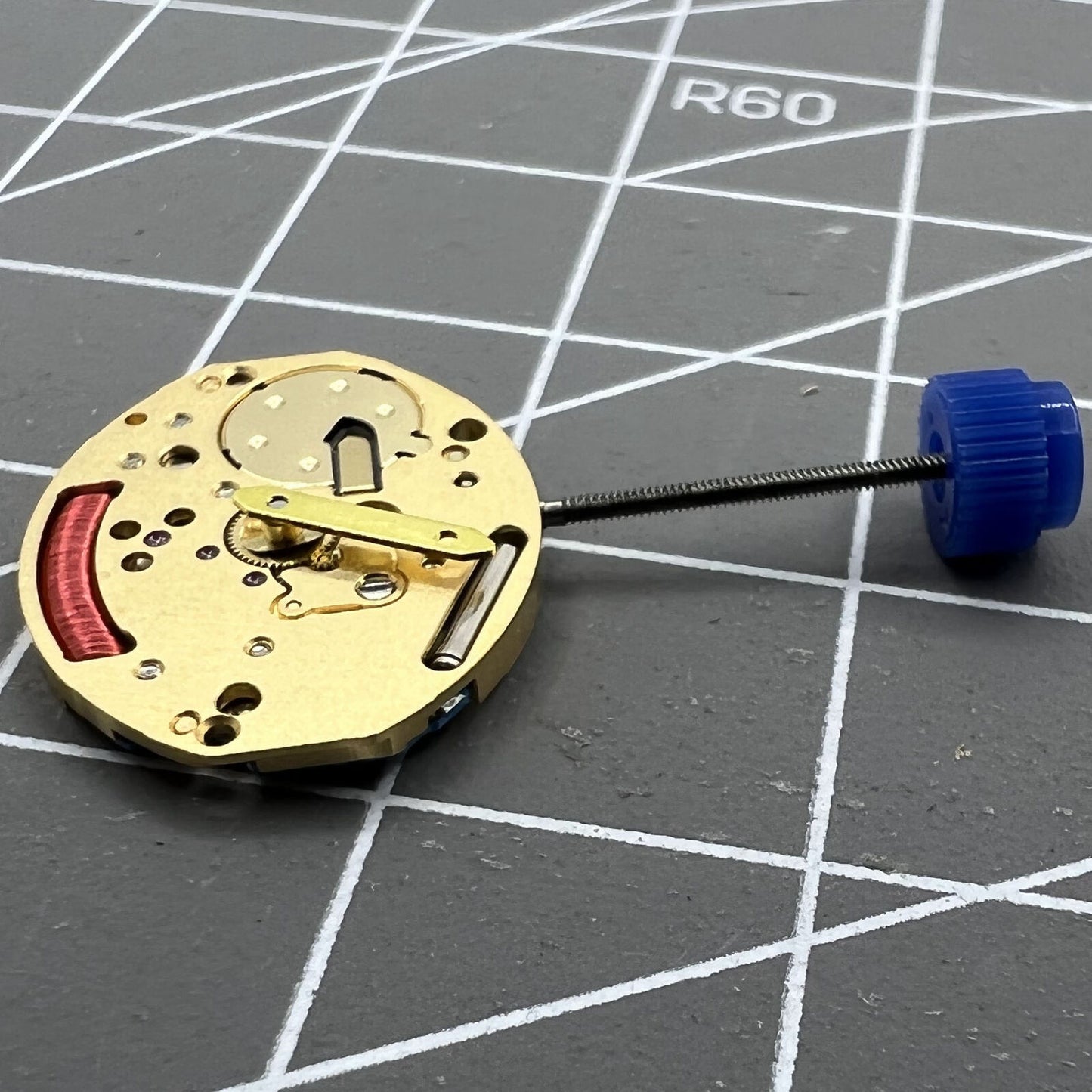 Swiss Made ETA E03.001 quartz watch movement with 2 hands, precision timekeeping by ETA brand.