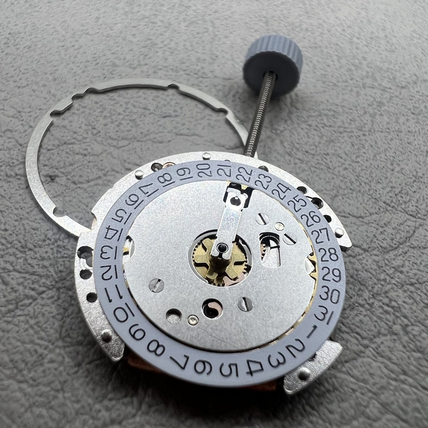 Swiss Ronda 775 quartz watch movement with date display at 3 o'clock, precision timekeeping