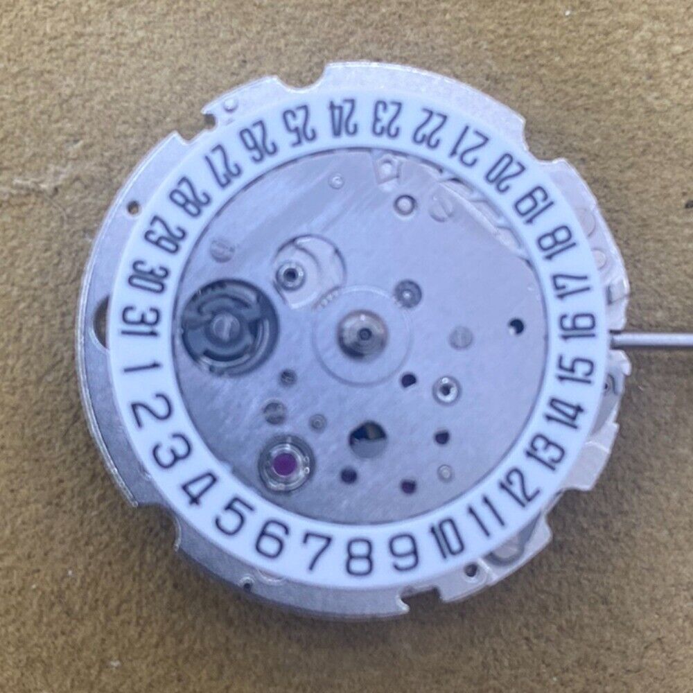 Citizen watch part featuring Japan Made 8200/8215 movement with single calendar date at 6 o'clock.