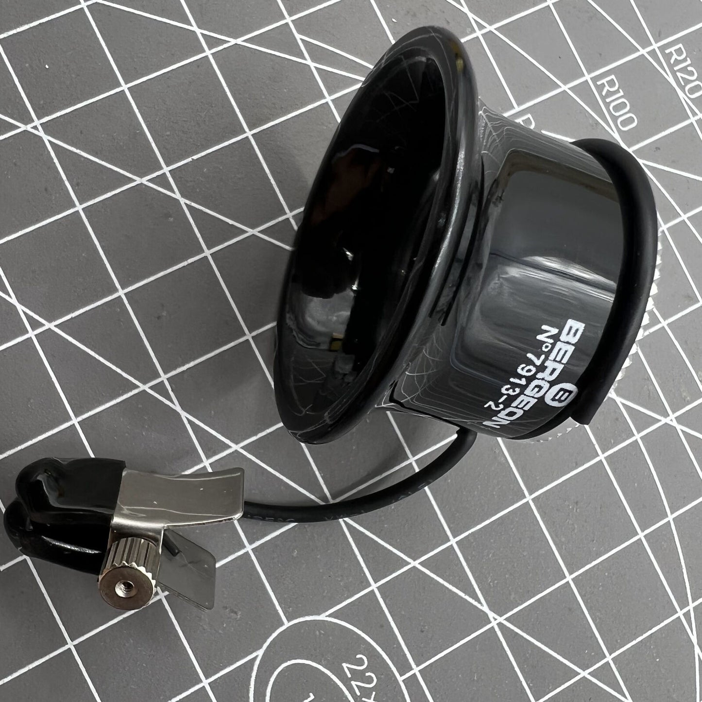 Swiss Bergeon precision magnifying eyeglass clip for detailed watch repairs and craftsmanship.