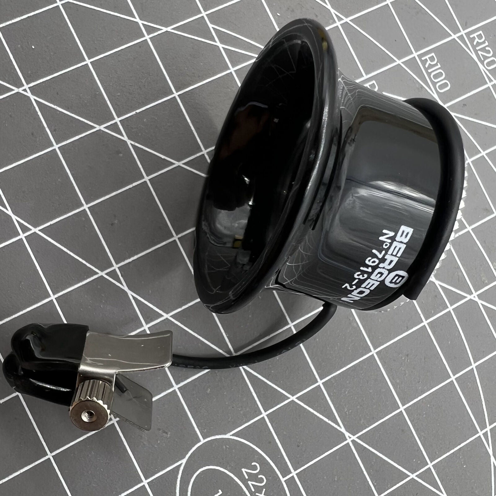 Swiss Bergeon precision magnifying eyeglass clip for detailed watch repairs and craftsmanship.