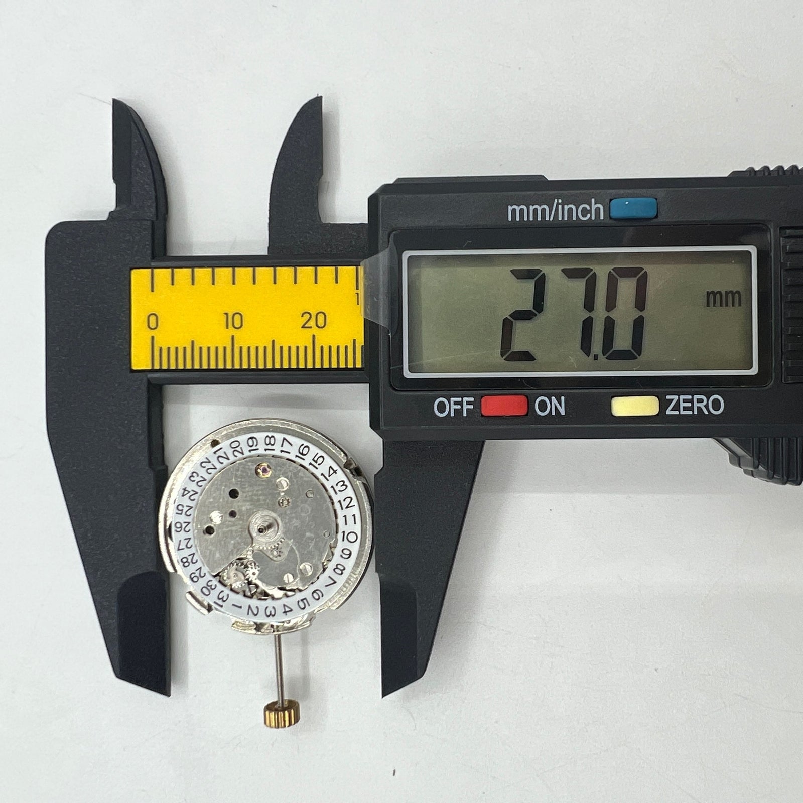 26.5mm 7120 mechanical watch movement with single calendar and three hands for accurate timekeeping.