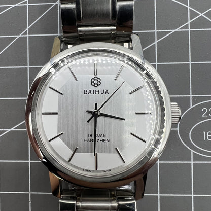 37mm China Baihua manual mechanical watch with silver dial, 19 jewels, shock-resistant for lasting precision.