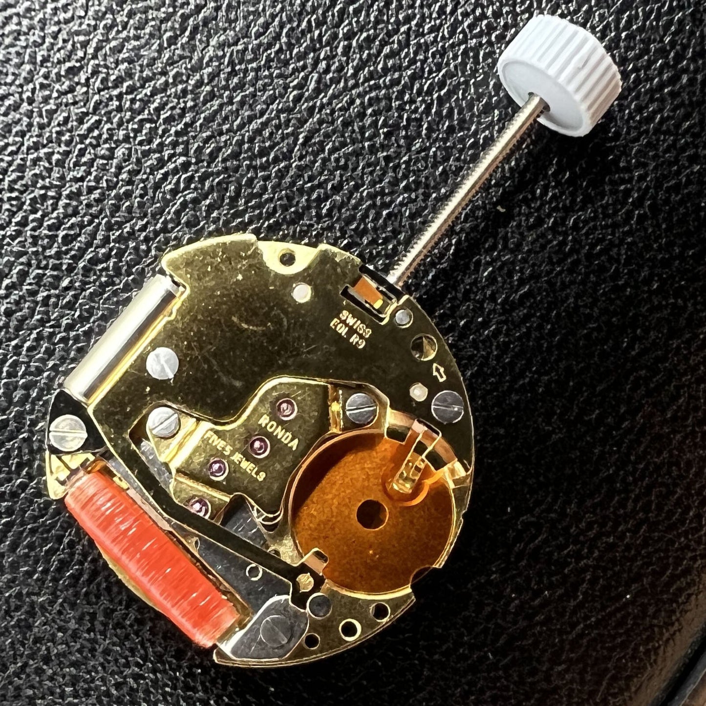 Swiss Made Ronda 775 golden quartz movement with date display at 6 o?clock, ideal for Swiss watch brands.